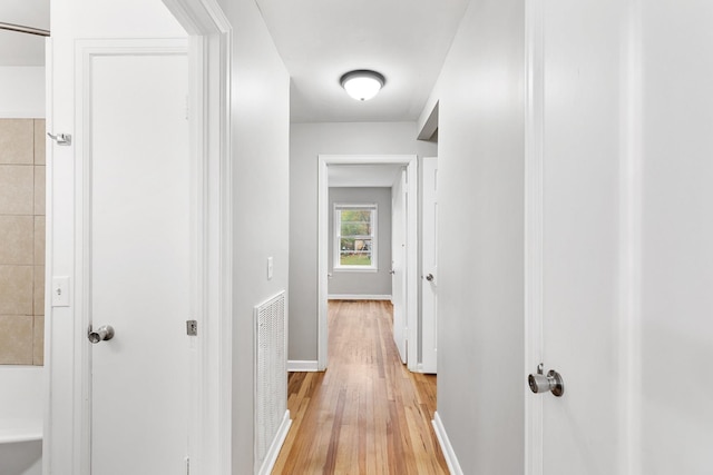 hallway featuring light hardwood / wood-style floors