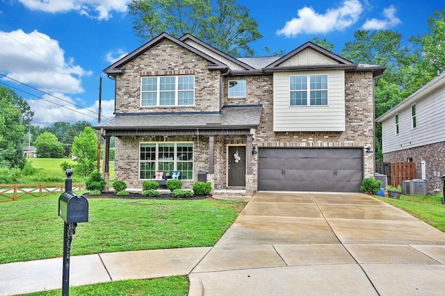 craftsman-style house with a garage and a front yard