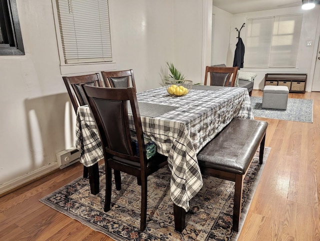 dining room with hardwood / wood-style floors