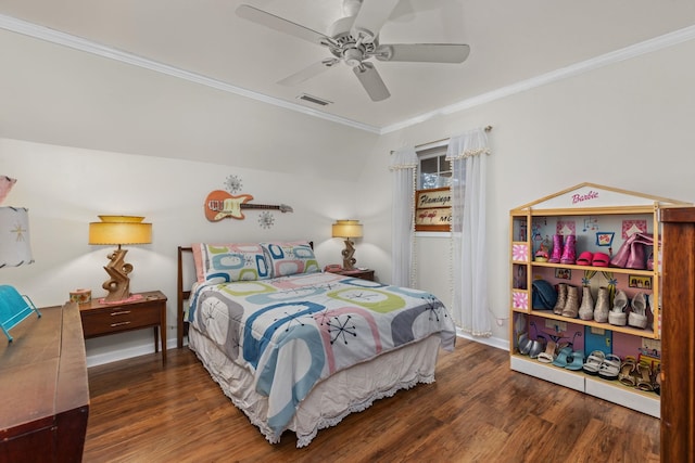 bedroom with dark hardwood / wood-style flooring, ceiling fan, and crown molding