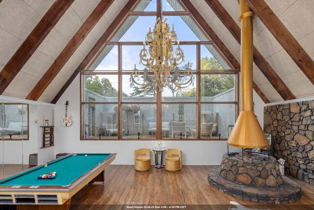 rec room featuring hardwood / wood-style flooring, high vaulted ceiling, beamed ceiling, and pool table