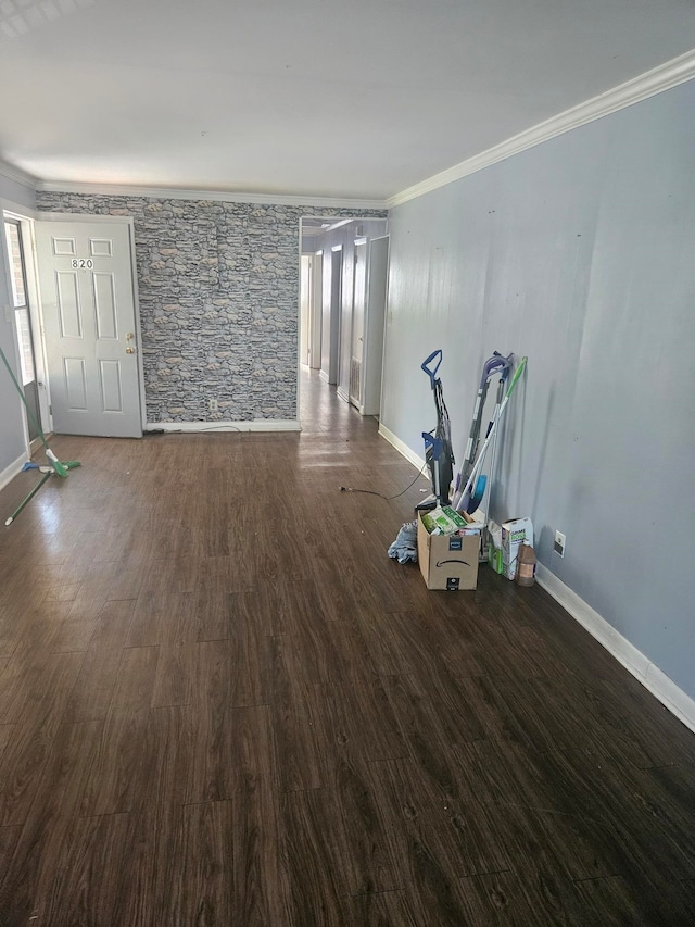 spare room with dark hardwood / wood-style floors and ornamental molding