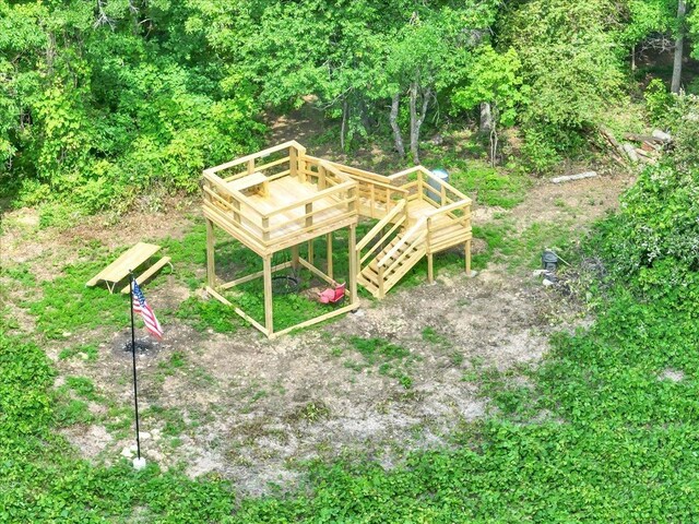 - view of home's community with a deck