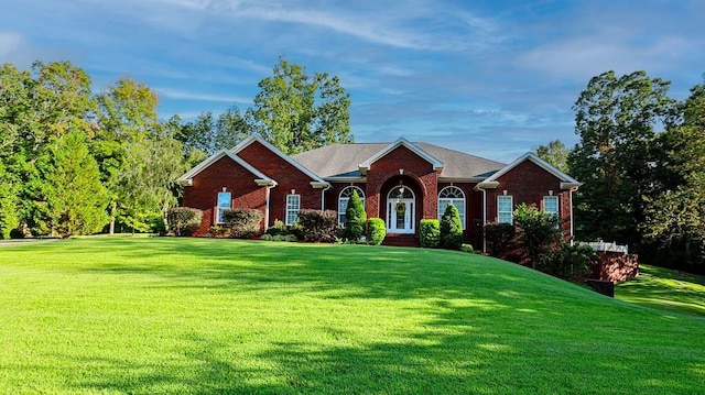 ranch-style house with a front yard