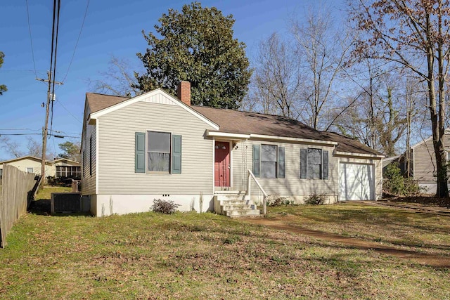 view of front of home featuring fence, a front yard, a garage, central AC unit, and a chimney