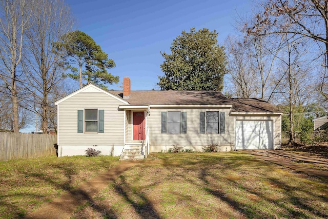 ranch-style house featuring a front yard, a chimney, an attached garage, and fence