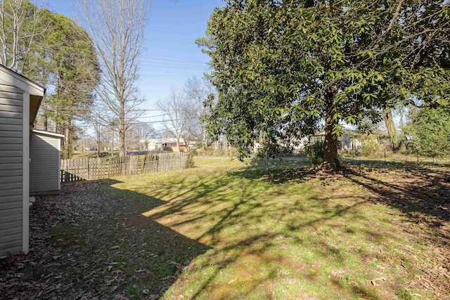 view of yard with fence