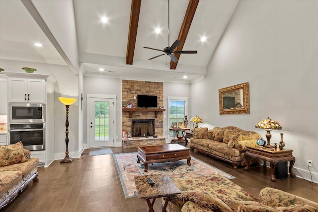 living room featuring plenty of natural light, ceiling fan, dark wood finished floors, high vaulted ceiling, and beam ceiling