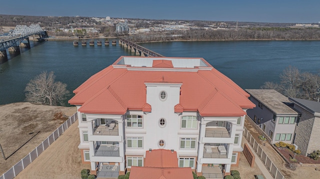 drone / aerial view featuring a water view