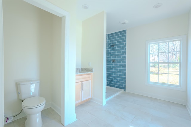  - full bathroom with a stall shower, vanity, and tile patterned floors