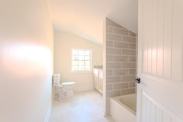  - bathroom featuring vaulted ceiling, vanity, tile patterned floors, and shower / washtub combination