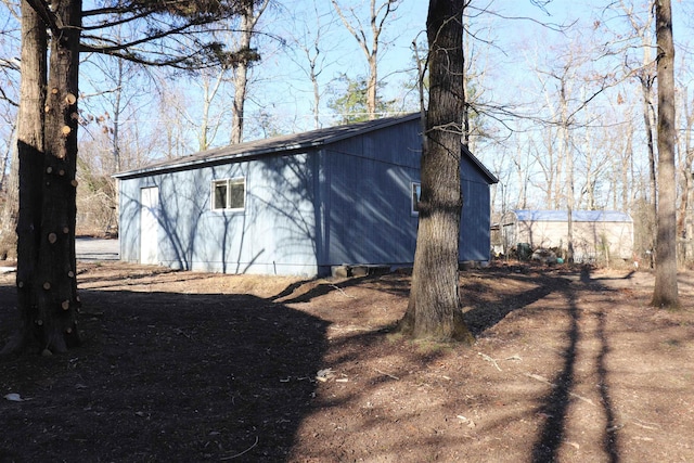 exterior space with an outbuilding