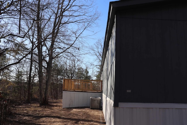 view of yard with a sunroom and a deck