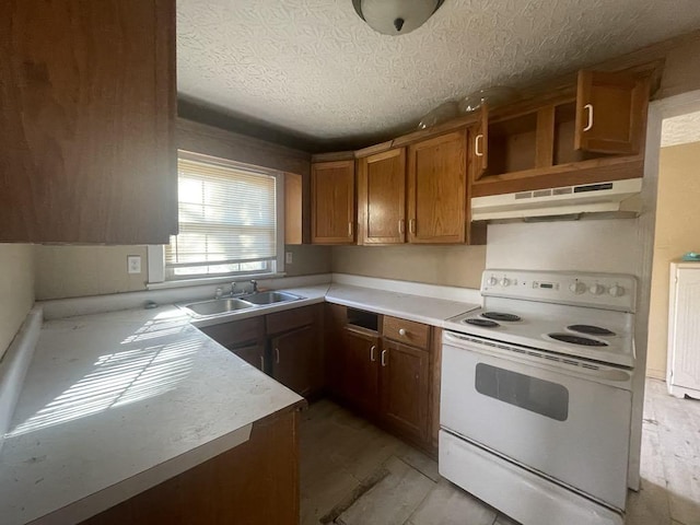 kitchen with sink, a textured ceiling, and white electric range oven