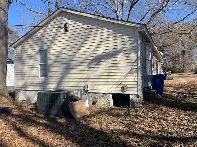 view of home's exterior featuring central AC