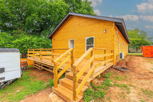  - back of property featuring a deck