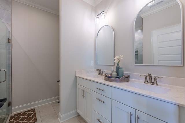 181 Silver Leaf Ln, Florence, AL - full bathroom with double vanity, ornamental molding, a shower stall, and tile patterned floors