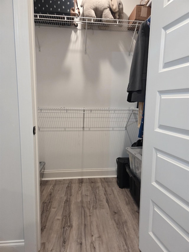 181 Silver Leaf Ln, Florence, AL - walk in closet featuring wood finished floors