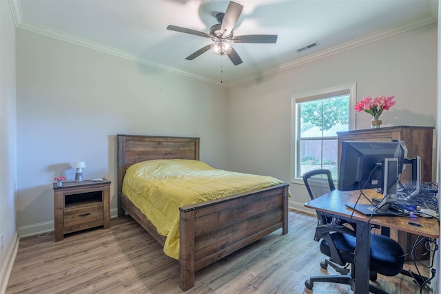 181 Silver Leaf Ln, Florence, AL - bedroom featuring light wood-style flooring, crown molding, an office area, and a ceiling fan
