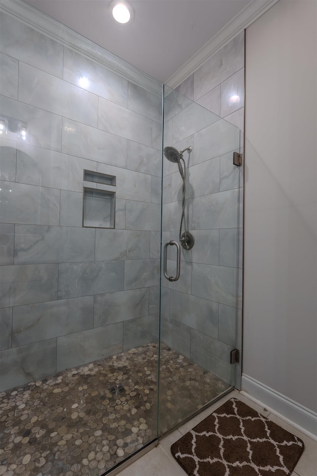 181 Silver Leaf Ln, Florence, AL - bathroom with crown molding, a stall shower, and tile patterned floors