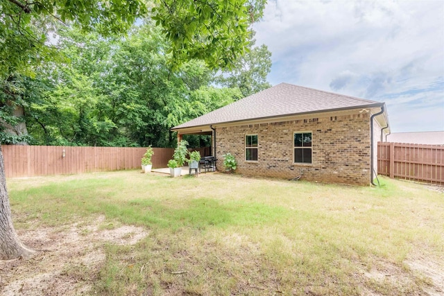 181 Silver Leaf Ln, Florence, AL - fenced backyard featuring a patio area