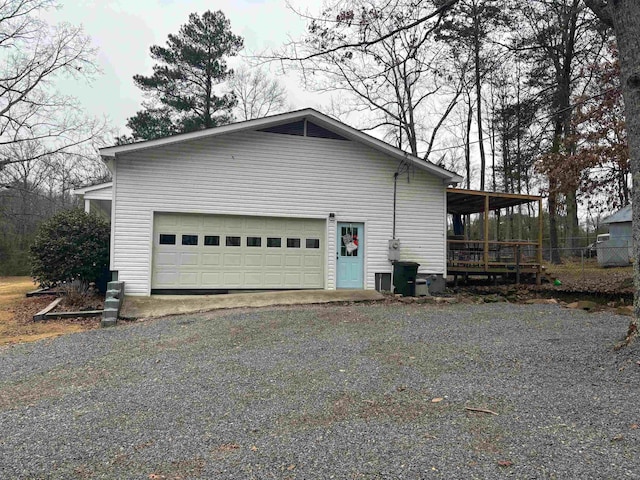 view of side of property featuring a garage