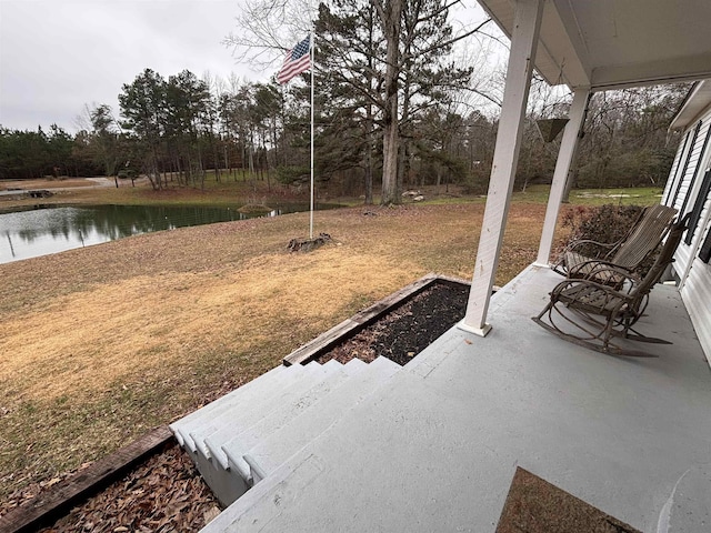 view of patio / terrace featuring a water view