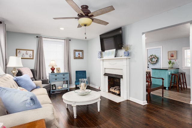  - living area featuring hardwood / wood-style flooring, a fireplace with flush hearth, ceiling fan, baseboards, and recessed lighting