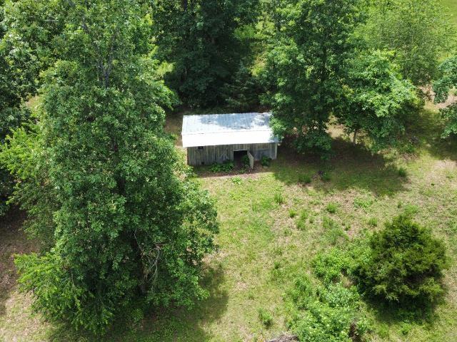  - aerial view of property and surrounding area