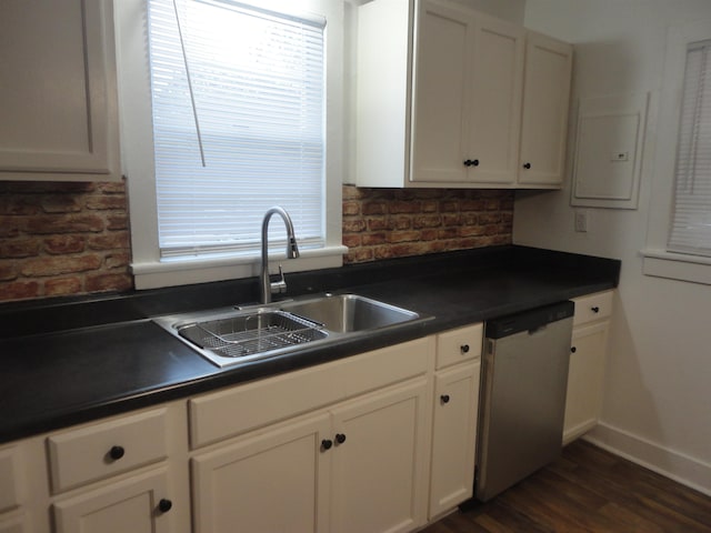 kitchen featuring dark hardwood / wood-style flooring, stainless steel dishwasher, sink, white cabinets, and electric panel