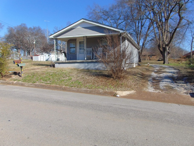 bungalow-style home with covered porch