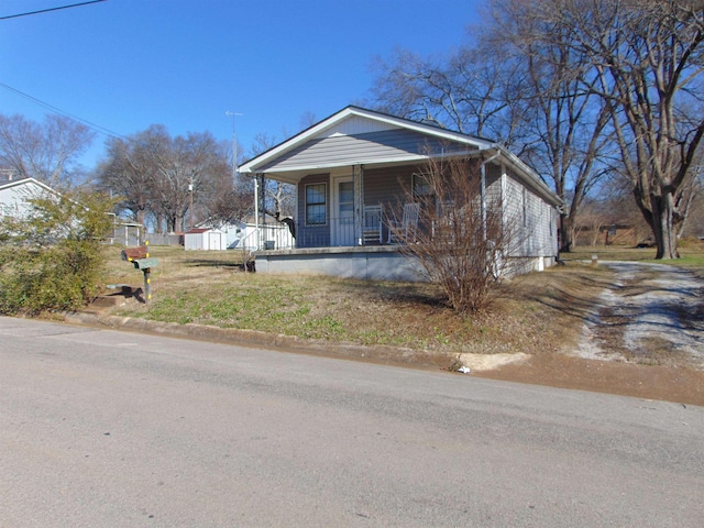 bungalow-style house with covered porch