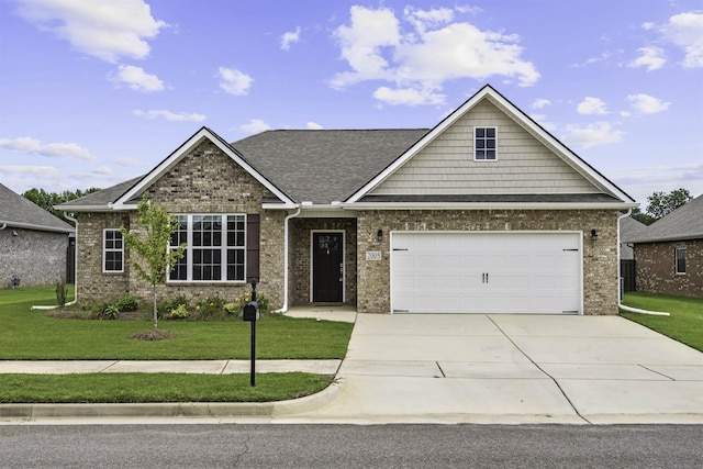 craftsman-style house featuring a garage and a front yard