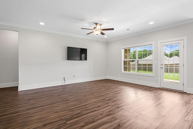 unfurnished living room with ceiling fan, ornamental molding, and dark hardwood / wood-style floors