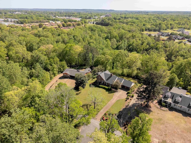  - birds eye view of property featuring a forest view