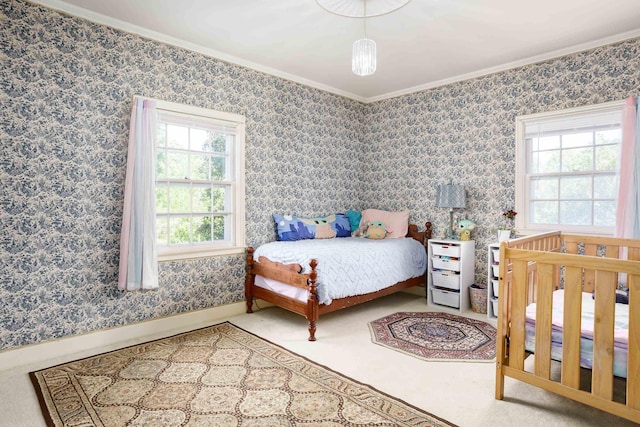  - bedroom featuring baseboards and ornamental molding
