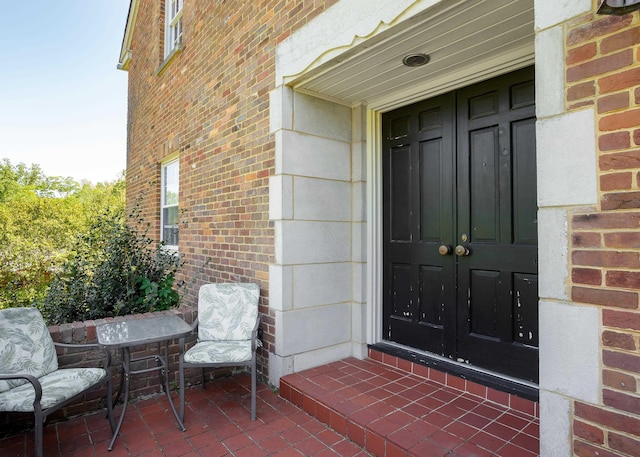  - property entrance with brick siding