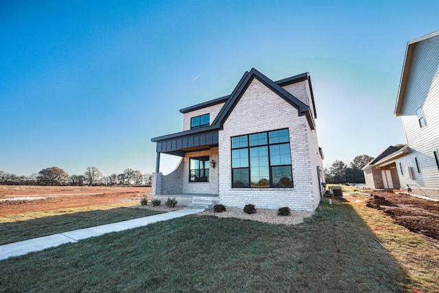 modern home with a front yard