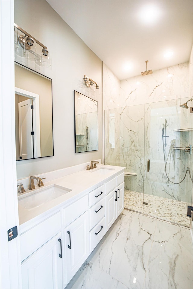 bathroom with vanity and an enclosed shower