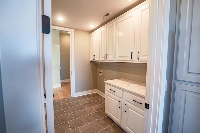 laundry area with cabinets and washer hookup