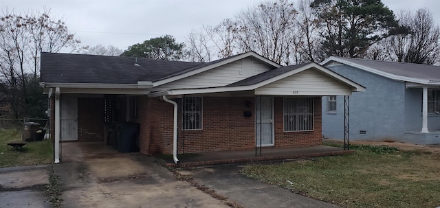 view of front of property with a carport and covered porch