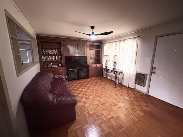  - living room featuring a ceiling fan