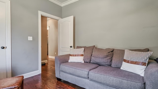 living room with dark hardwood / wood-style flooring and crown molding