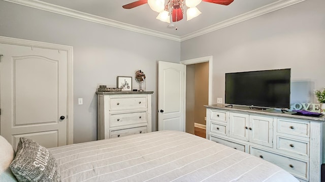 bedroom featuring ceiling fan and ornamental molding