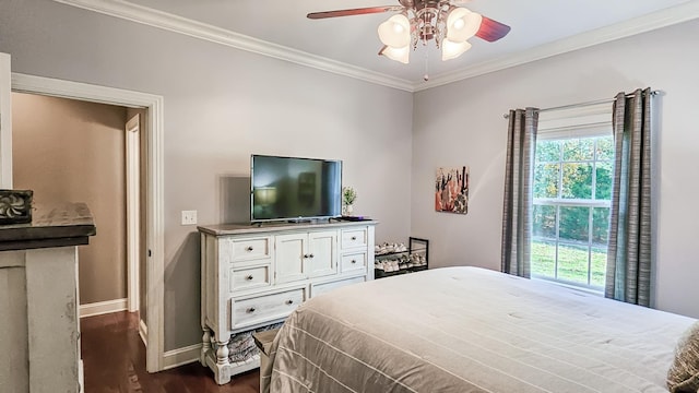 bedroom featuring ceiling fan, crown molding, and dark wood-type flooring