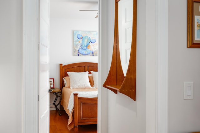 bedroom featuring wood finished floors