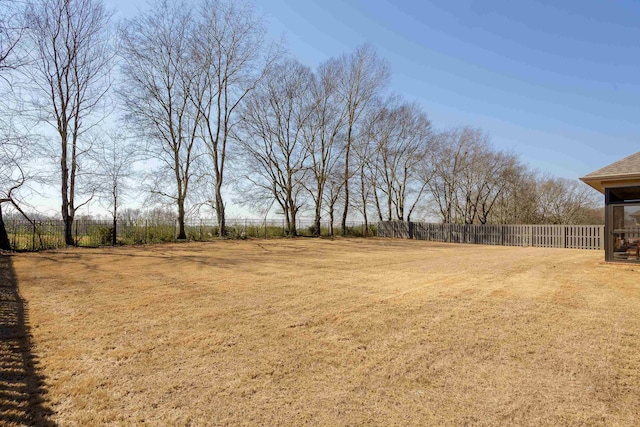 view of yard with fence