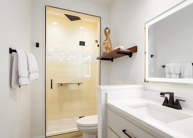 full bathroom featuring vanity, toilet, baseboard heating, and a shower stall