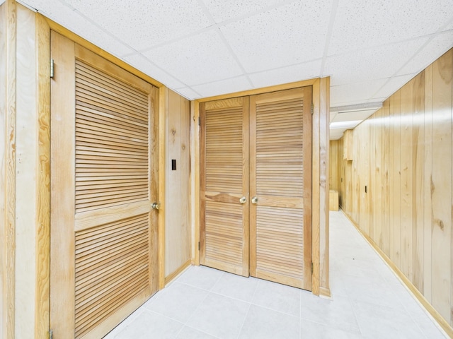  - detailed view of a drop ceiling and wood walls