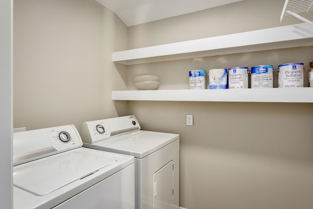 laundry room with washer and clothes dryer